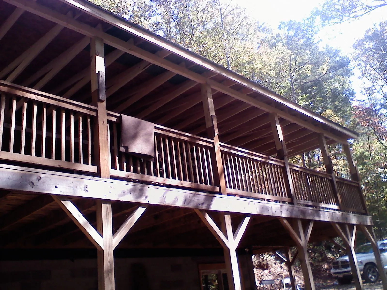 Timber framing under a new elevated porch and deck — Roof Leak Repair in Addison by Roofing Brothers